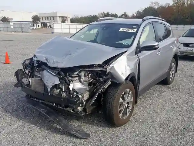 JTMRJREV5JD240135 2018 TOYOTA RAV4 HV LE-1