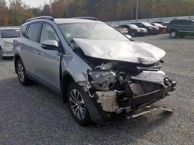 JTMRJREV5JD240135 2018 TOYOTA RAV4 HV LE-0