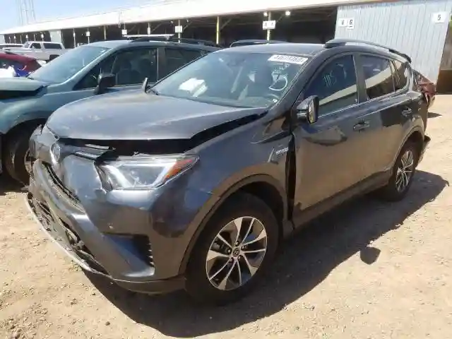 JTMRJREVXJD213190 2018 TOYOTA RAV4 HV LE-1