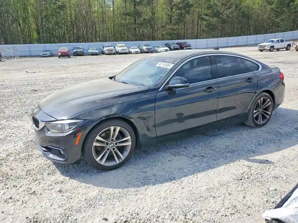 WBA4J1C58KBM12960 2019 BMW 4 SERIES-0