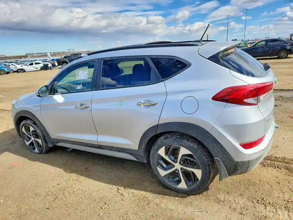 KM8J3CA28HU450315 2017 HYUNDAI TUCSON-1