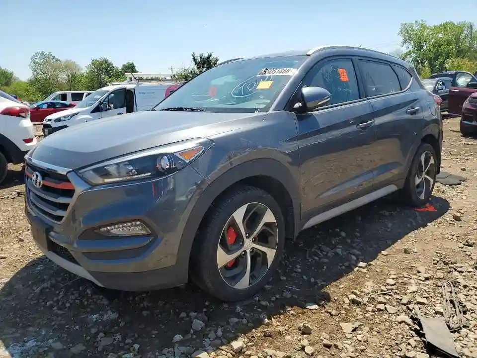 KM8J3CA24HU390226 2017 HYUNDAI TUCSON-0