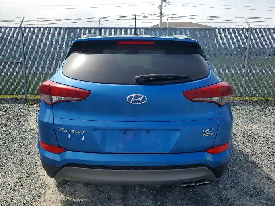 KM8J3CA25GU235540 2016 HYUNDAI TUCSON-5