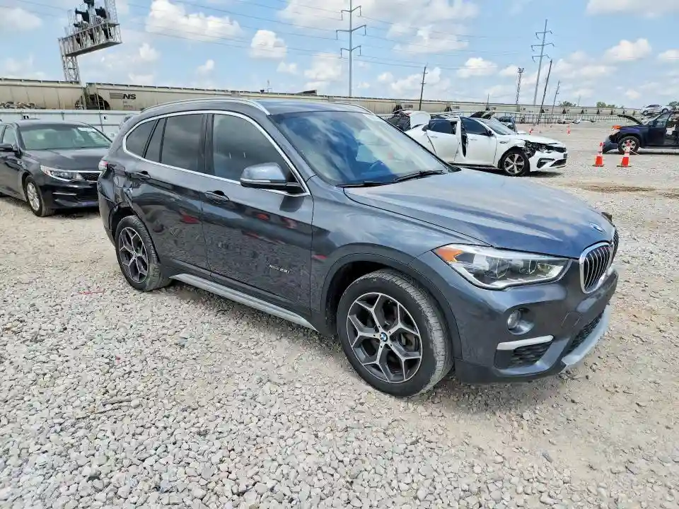 WBXHT3C34J5K27989 2018 BMW X1-3
